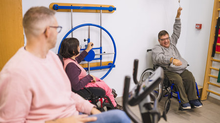 People with disabilities doing physiotherapy rehabilitation exercises