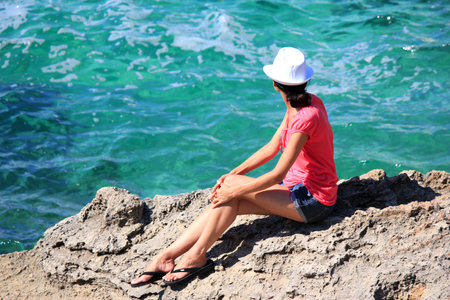 Fashion girl on the sea  の写真素材