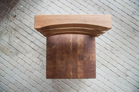 Wooden chair with metal frame on the verandaの写真素材