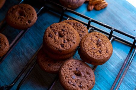 Baked chocolate chip cookies on an artistic background.の写真素材