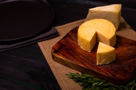 Cheese with serrano ham, olives on a table for a party with friends or as an aperitifの写真素材