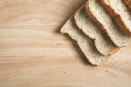many bread slice on the wood blockの写真素材