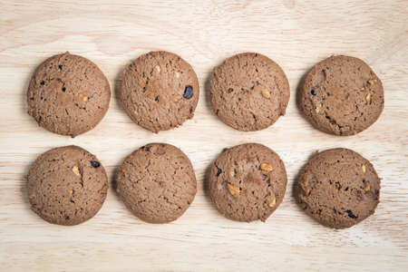 some cookies arrange on the wood blockの写真素材