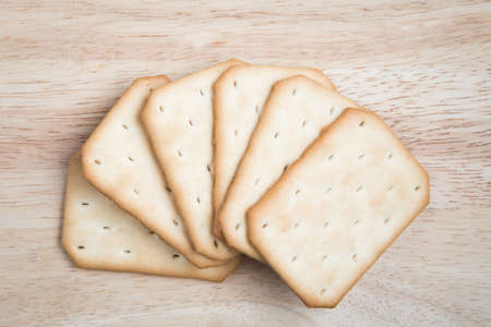 Salty crackers in square shape arrange like some cardsの写真素材