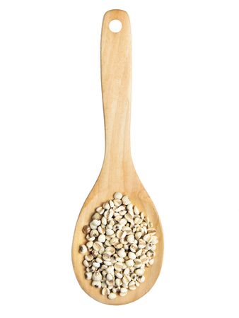 Isolated scoop of millet on the white backgroundの写真素材