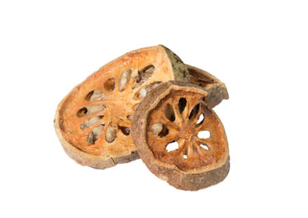 Isolated pile of dried beal fruit on a white backgroundの写真素材