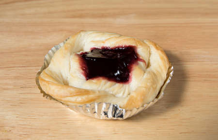blueberry pie on a wood backgroundの写真素材