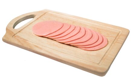 sliced ham arrange on wood blockの写真素材