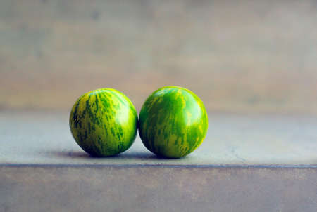 Green Zebra tomatoes in color like watermelonの写真素材