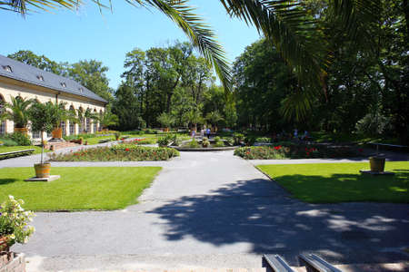 Warsaw, Poland - 30 July 2017: Garden near Wilanow Palace. Palace garden Wilanow with walking peopleのeditorial素材