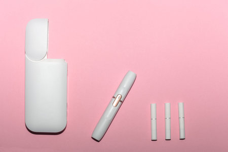White electronic cigarette isolated on pink