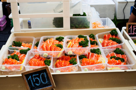 Pieces of red salmon fish selling on Phuket street market, Thailand