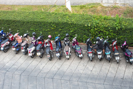 Phuket, Thailand - 26 February 2018: Many motorbikes parking lot, top view