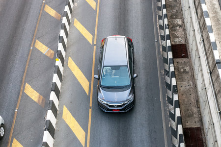 Phuket, Thailand - 26 February 2018: Honda gray car driving on highway road. left-hand traffic top viewのeditorial素材