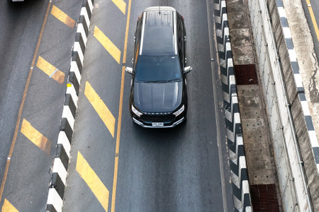 Phuket, Thailand - 26 February 2018: Ford Everest black car driving on road top viewのeditorial素材