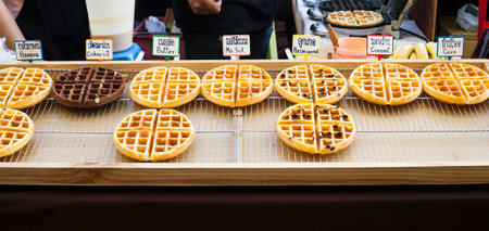 Different waffles on street market in Phuket, Thailandの写真素材