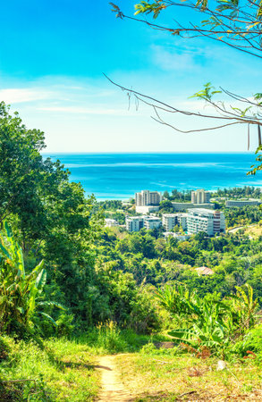 Phuket spring landscape by blue sky in Thailand. Aerial view of thai green islandの写真素材