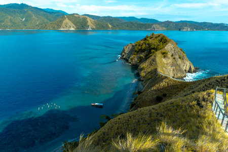 Beautiful view of Pulo Dua Balantak hill, view of blue sea and white clouds with blue sky located in the Banggai district of Central Sulawesi, Indonesiaの写真素材