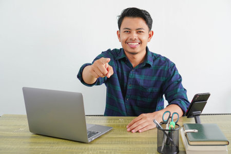 happy young asian man sit work at wooden desk with pc laptop. Achievement business career lifestyle...