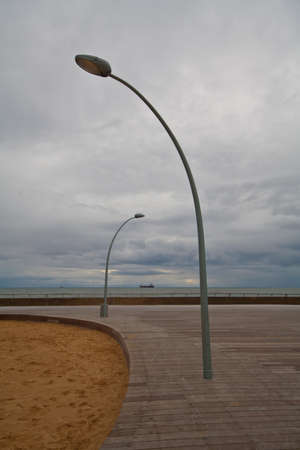 Two street lamp on Tel Aviv embankment at eveningの写真素材