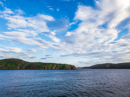 Contrast beautiful scene with green islandの写真素材