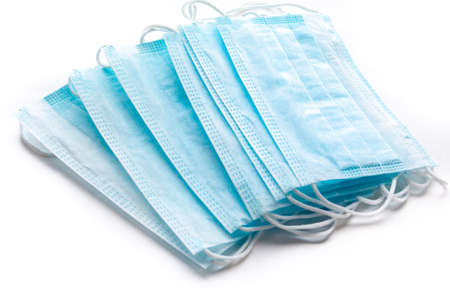 Medical mask, Medical protective mask on wight background. Disposable surgical face mask cover the mouth and nose.の写真素材