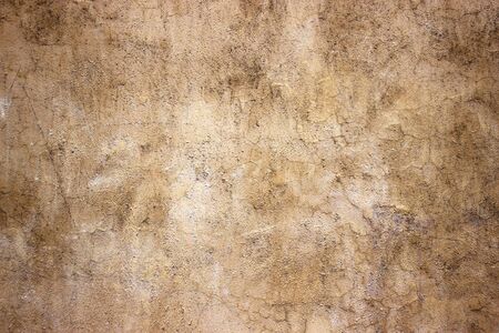 Beige wall texture, background colored concrete, cement abstract structureの写真素材