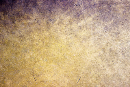 bronze texture, golden hue metal surface as a backgroundの写真素材