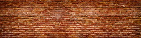 brick wall of red color, wide panorama of masonryの写真素材
