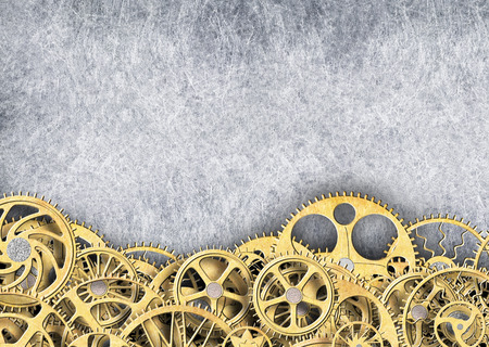 gold gear, industrial background of the mechanism of wheels with teethの写真素材
