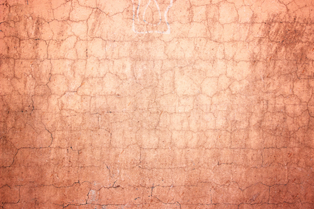 Orange cement wall concrete texture close-up as background for designの写真素材