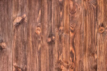 Dark Brown wood plank wall texture backgroundの写真素材