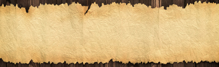 Old manuscript paper on the table, background for textの写真素材