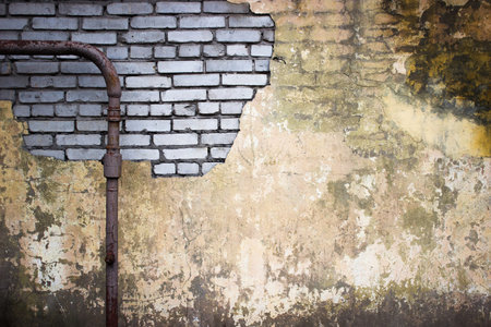 old brick wall destroyed plaster texture grunge weathered surface as background