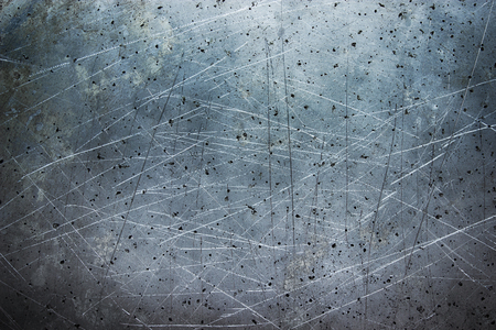 dark metal background, gray texture steel stains from the brushの写真素材