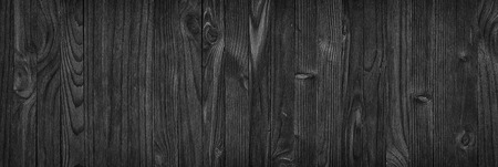 Black wooden boards table or floor, blank wood backgroundの写真素材
