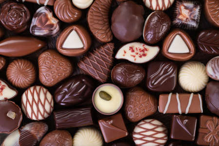 mix chocolate candy, sweet snack, food background.の写真素材