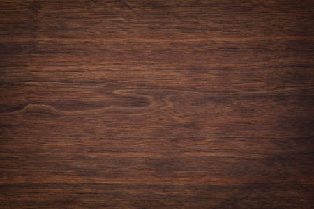 dark brown wood texture, old walnut boards. wooden panel backgroundの写真素材