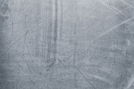 Grunge metal pattern, dirty aluminum texture with dents and scratches as backgroundの写真素材