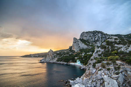 Sunset landscape with Cat Mountain in Blue Bay, Crimea, Russiaの写真素材