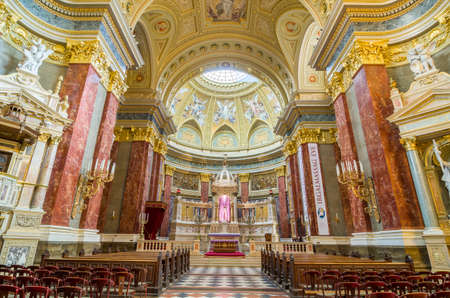 BUDAPEST, HUNGARY - FEBRUARY 22, 2016: Interior of the roman catholic church St. Stephen's Basilica. Ceiling, sanctuary and altar. Budapest, Hungary.のeditorial素材