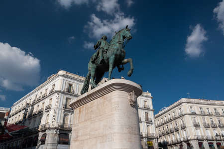 MADRID, SPAIN - SEPTEMBER 26, 2014: Equestrian statue of Carlos III on Plaza del Sol Square in Madrid, Spain.のeditorial素材