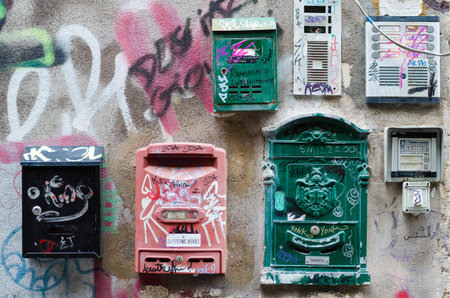 Catania, Italy - September 13, 2015: Various mailboxes. Different colors and shapes