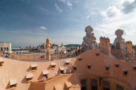 Barcelona - September 19, 2014: Exterior of the Casa Mila - La Pedrera by Antonio Gaudi. Chimneys known as espanta bruixes - witch scarers.のeditorial素材