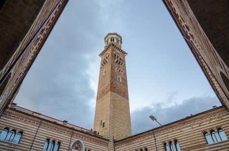 Verona, Italy - September 5, 2015: Lamberti tower on Erbe square in city Verona, Veneto, Italyのeditorial素材