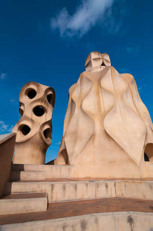 Barcelona - September 19, 2014: Exterior of the Casa Mila - La Pedrera by Antonio Gaudi. Chimneys known as espanta bruixes - witch scarers. Part of the UNESCO World Heritage Site. Barcelona, Spain.のeditorial素材