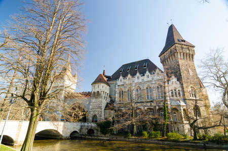 BUDAPEST, HUNGARY - FEBRUARY 22, 2016: Vajdahunyad Castle, City Park of Budapest, is designed in different styles: Romanesque, Gothic, Renaissance and Baroqueのeditorial素材