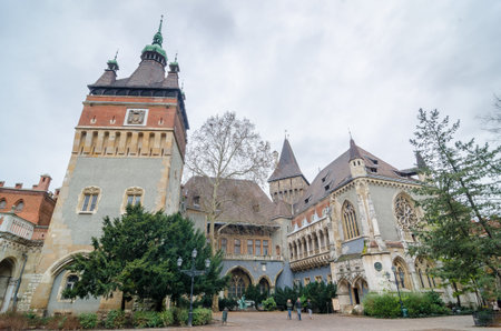 BUDAPEST, HUNGARY - FEBRUARY 23, 2016: Vajdahunyad Castle, City Park of Budapest, is designed in different styles: Romanesque, Gothic, Renaissance and Baroqueのeditorial素材