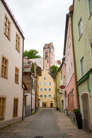 Fussen, Germany - June 4, 2016: View of pedestrian historical street in Fussen with typical bavarian architecture buildings.のeditorial素材