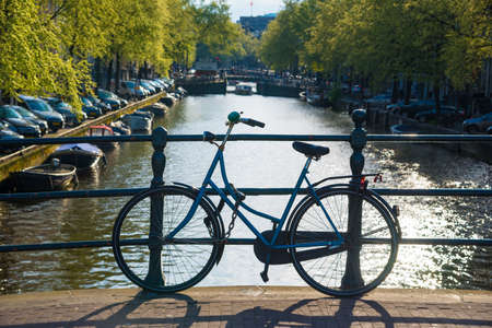 Bikes on the bridge in Amsterdam Netherlandsの写真素材
